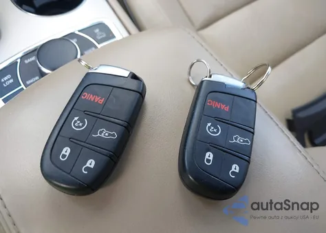 2015 Jeep Grand Cherokee Overland z USA, uszkodzony, nr VIN 1C4RJFCGXFC158420